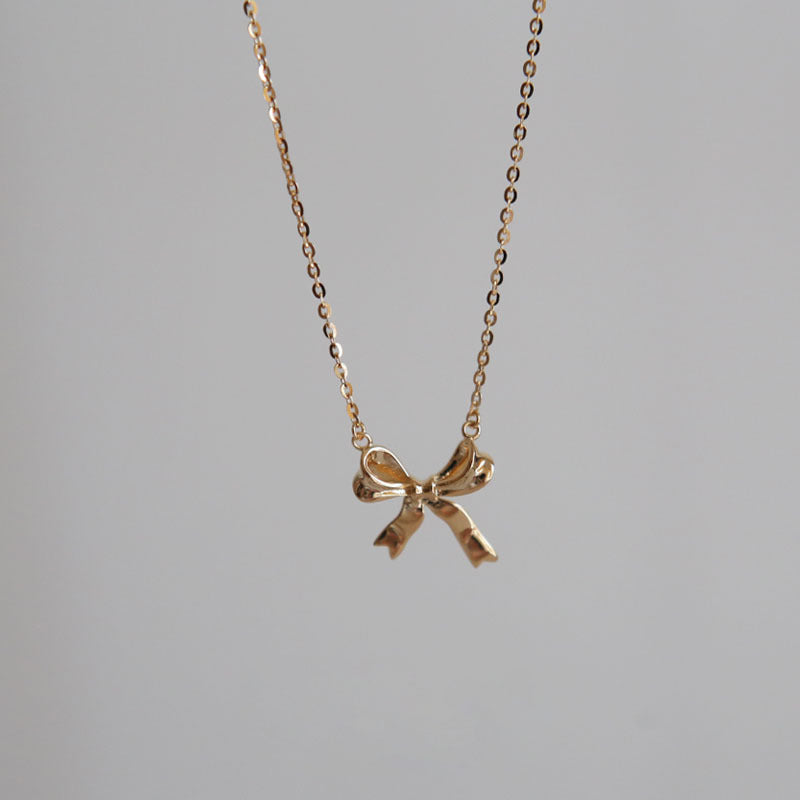 Bow Pendant Necklaces