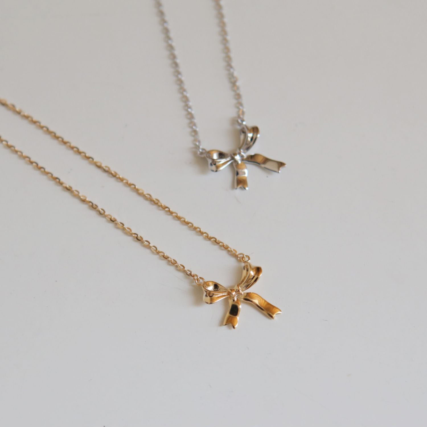 Bow Pendant Necklaces